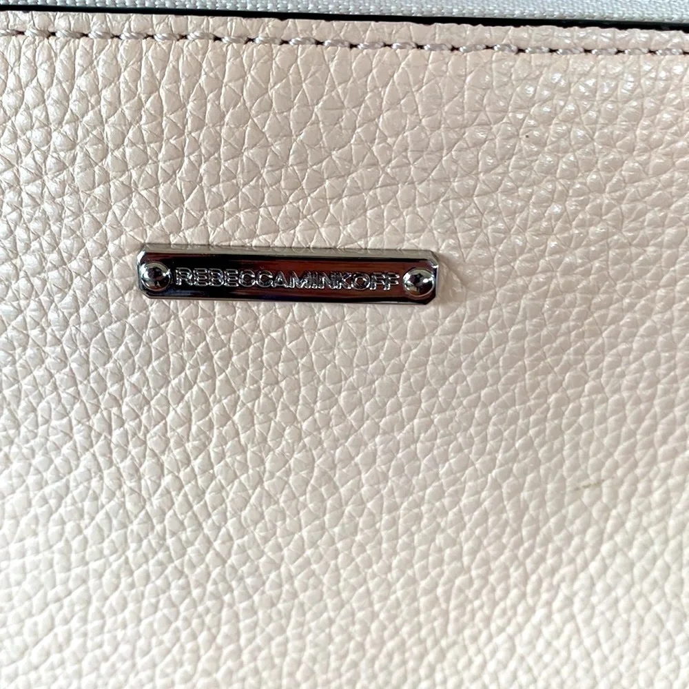 Rebecca Minkoff crossbody bag in a pale pink. Great summer bag! Zipper detail!